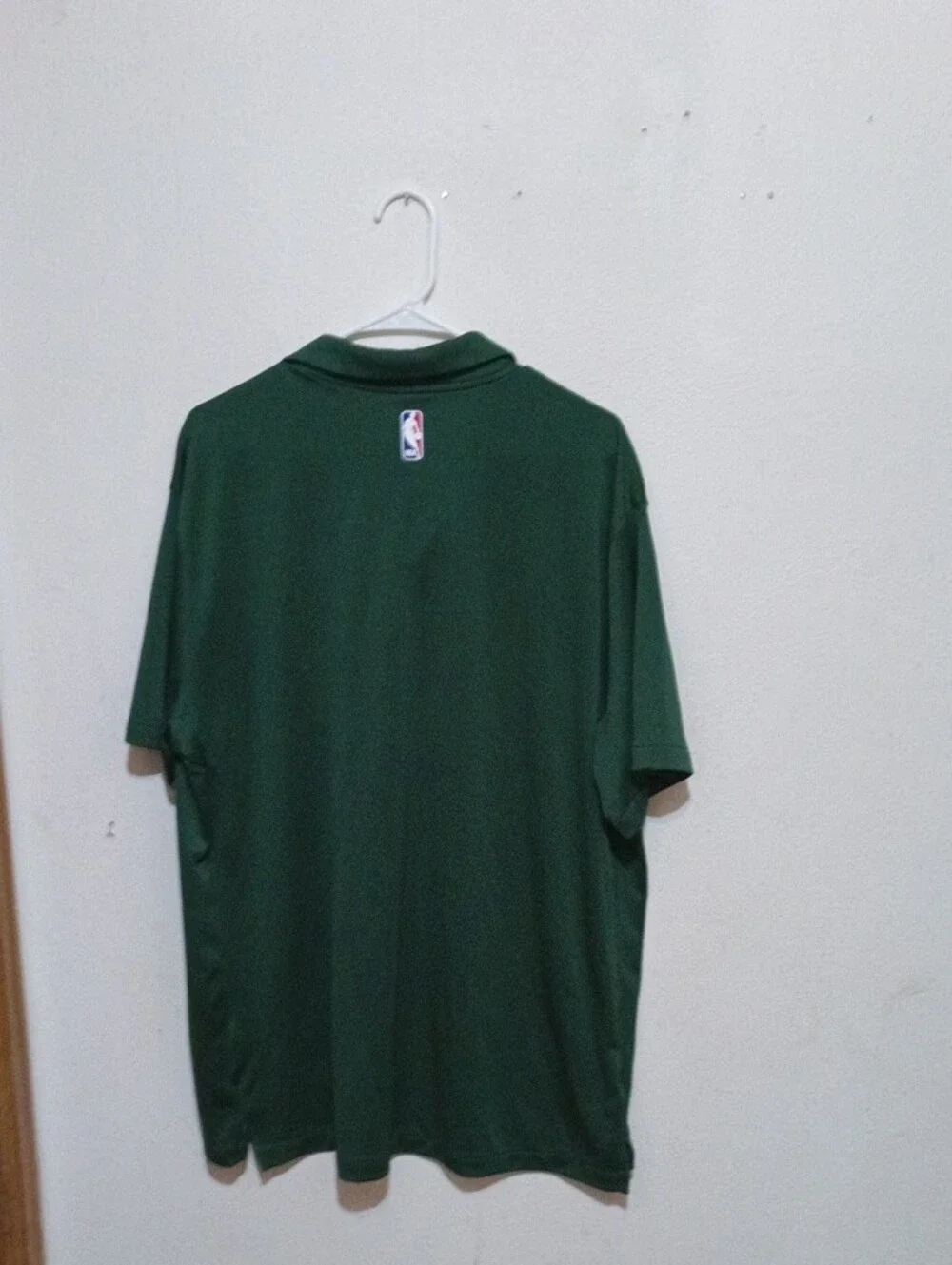 Nike Men’s Dark Green Bucks Polo with White Swoosh